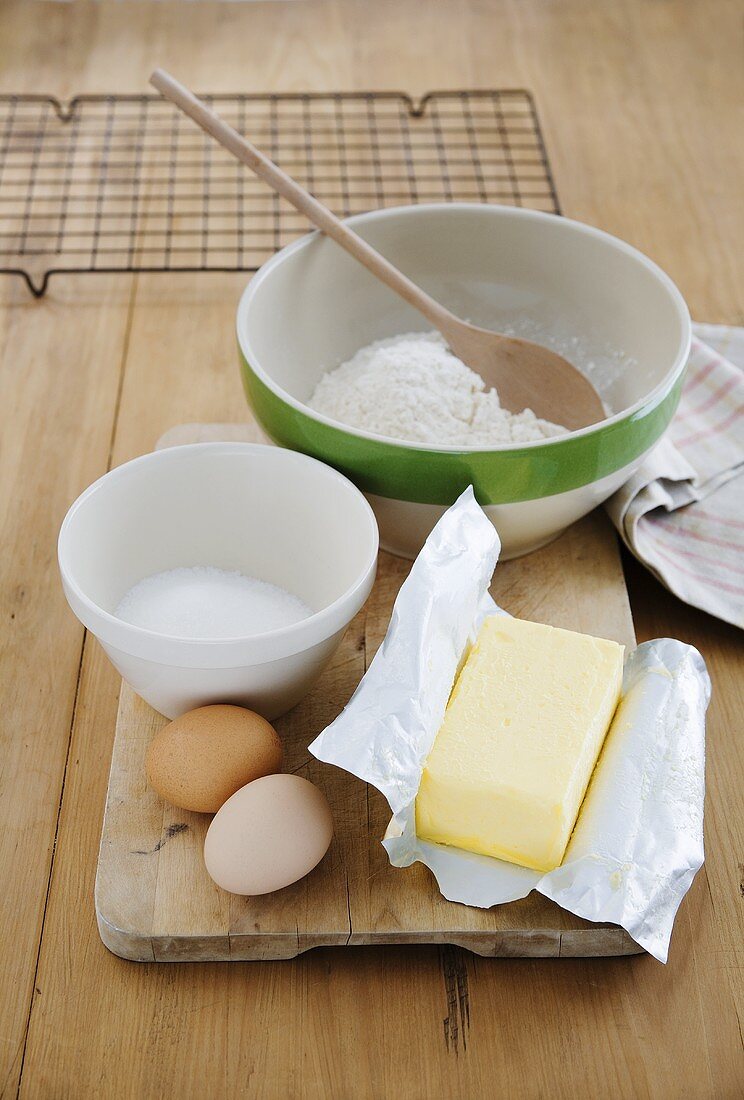 Baking ingredients: flour, sugar, eggs and butter