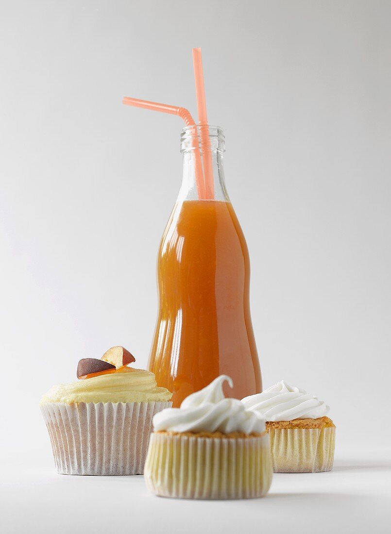 Cupcakes and a bottle of peach ice tea