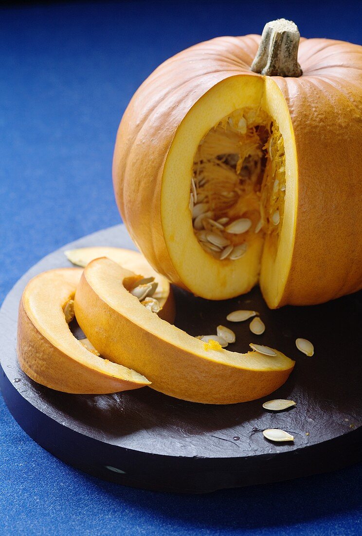 Pumpkin, sliced on a slate platter