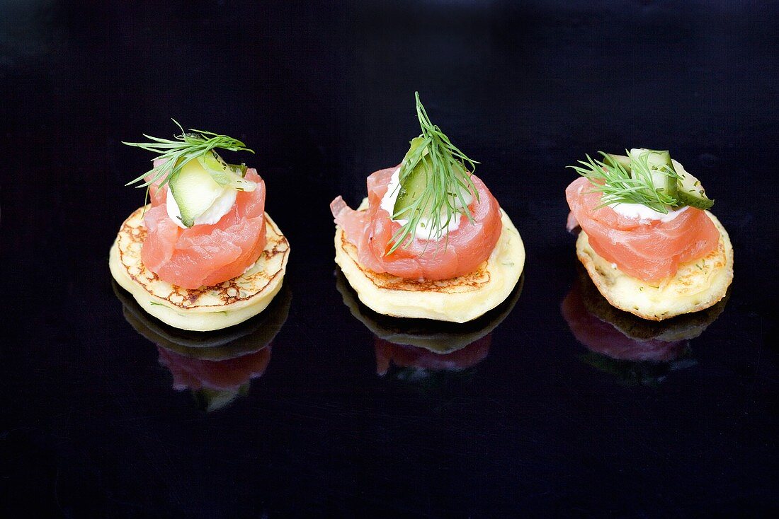 Blinis with smoked salmon, cream cheese, cucumber and dill