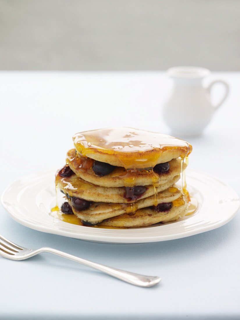 Blueberry pancakes with maple syrup