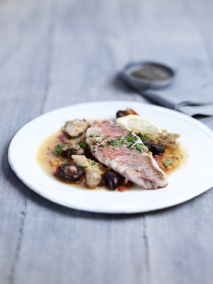 Pan-fried red snapper with artichokes