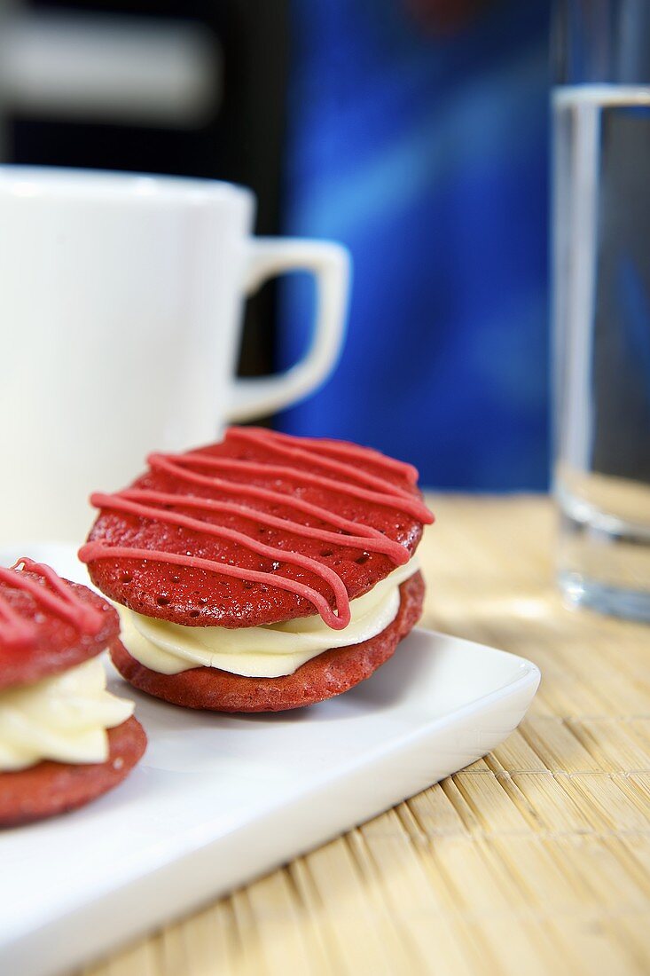 Raspberry whoopie pies filled with cream