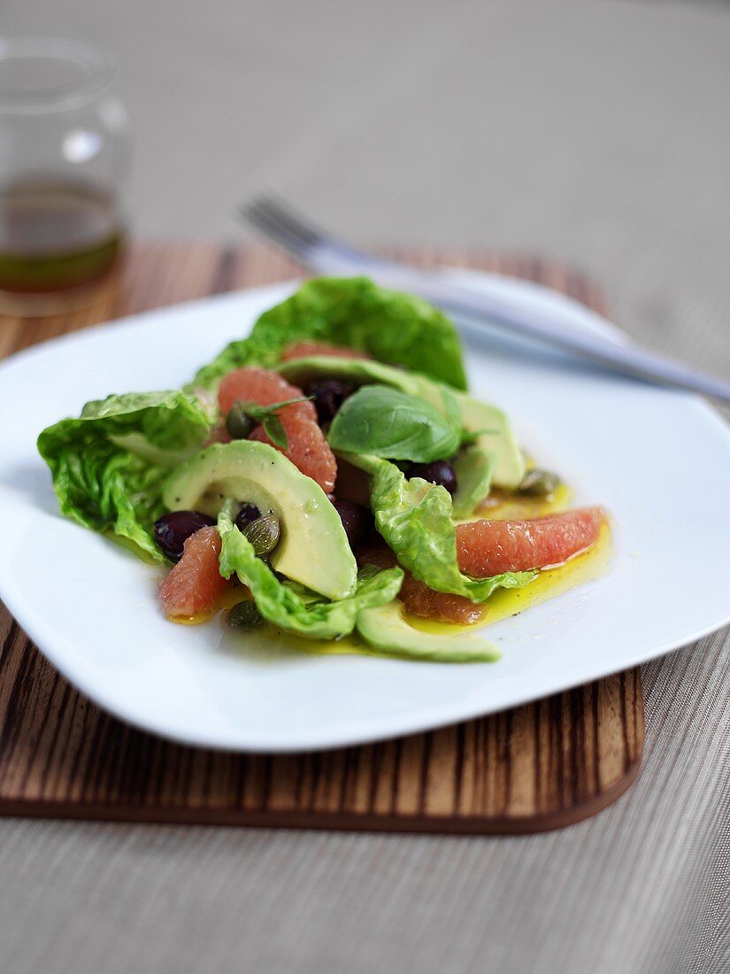 Avocado salad with grapefruit and olives