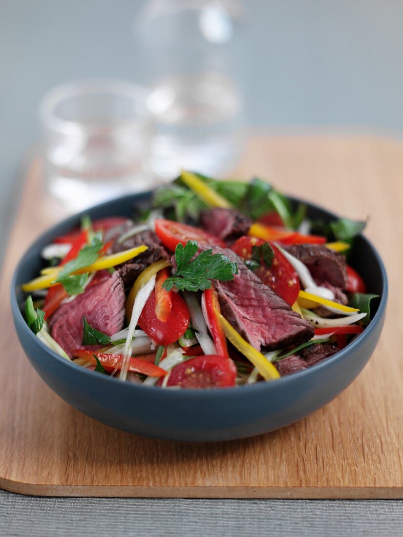 Vegetable salad with beef strips