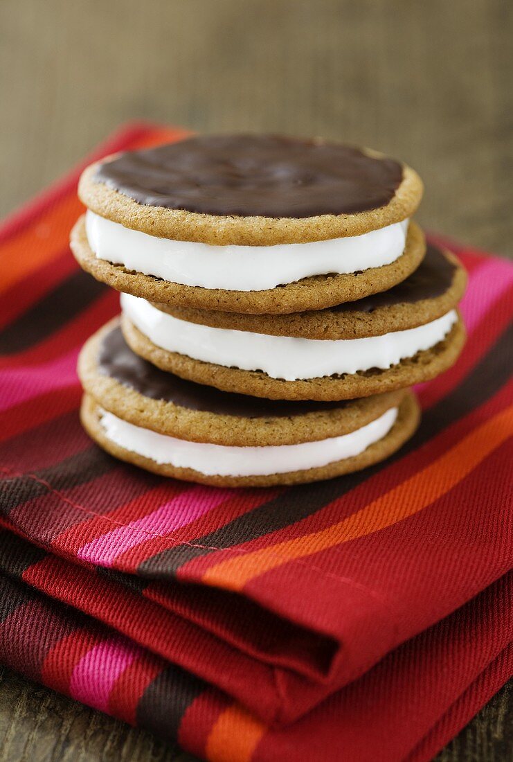 Moon pies (biscuits with a marshmallow filling) with chocolate icing