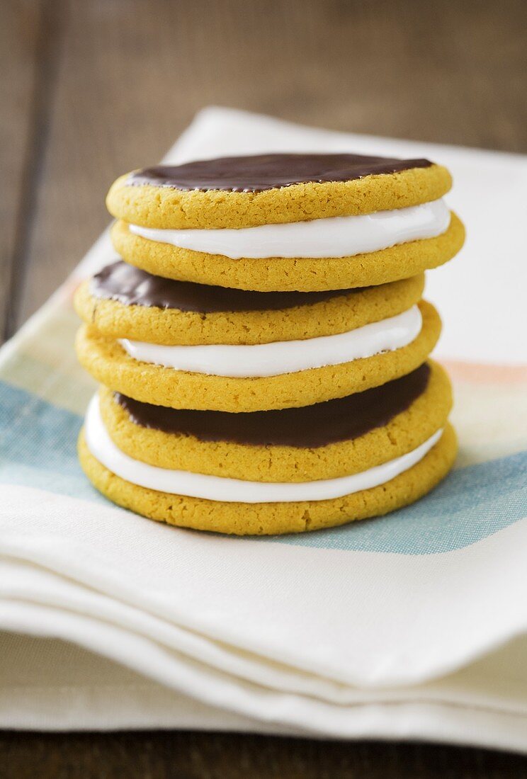 Banana moon pies with a marshmallow filling and chocolate icing