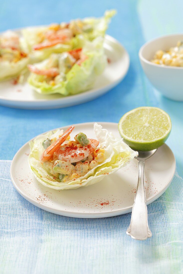 Iceberg lettuce with prawns and avocados