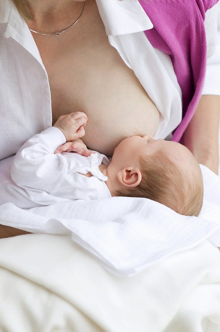 Mother breastfeeding her baby