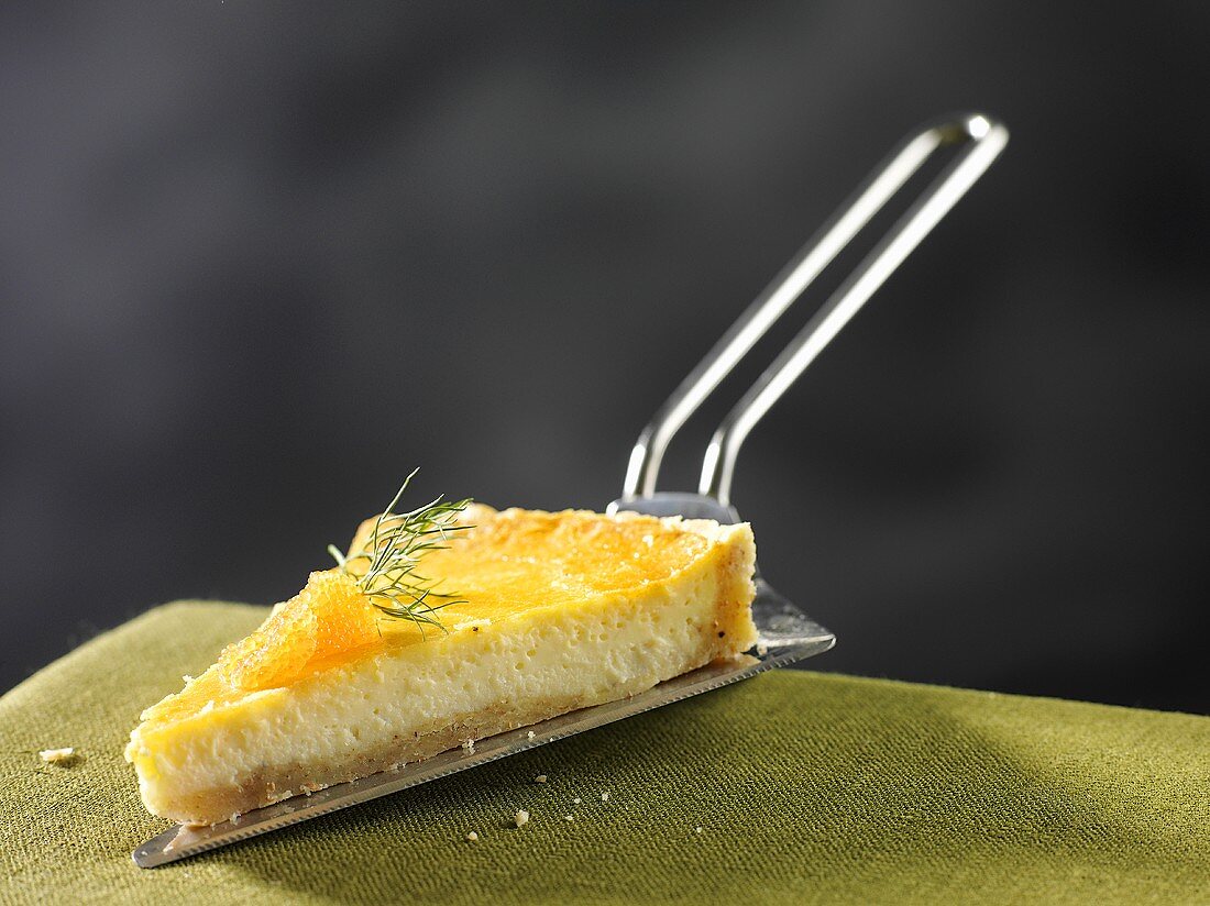 A slice of cheese pie with salmon and dill (Sweden)