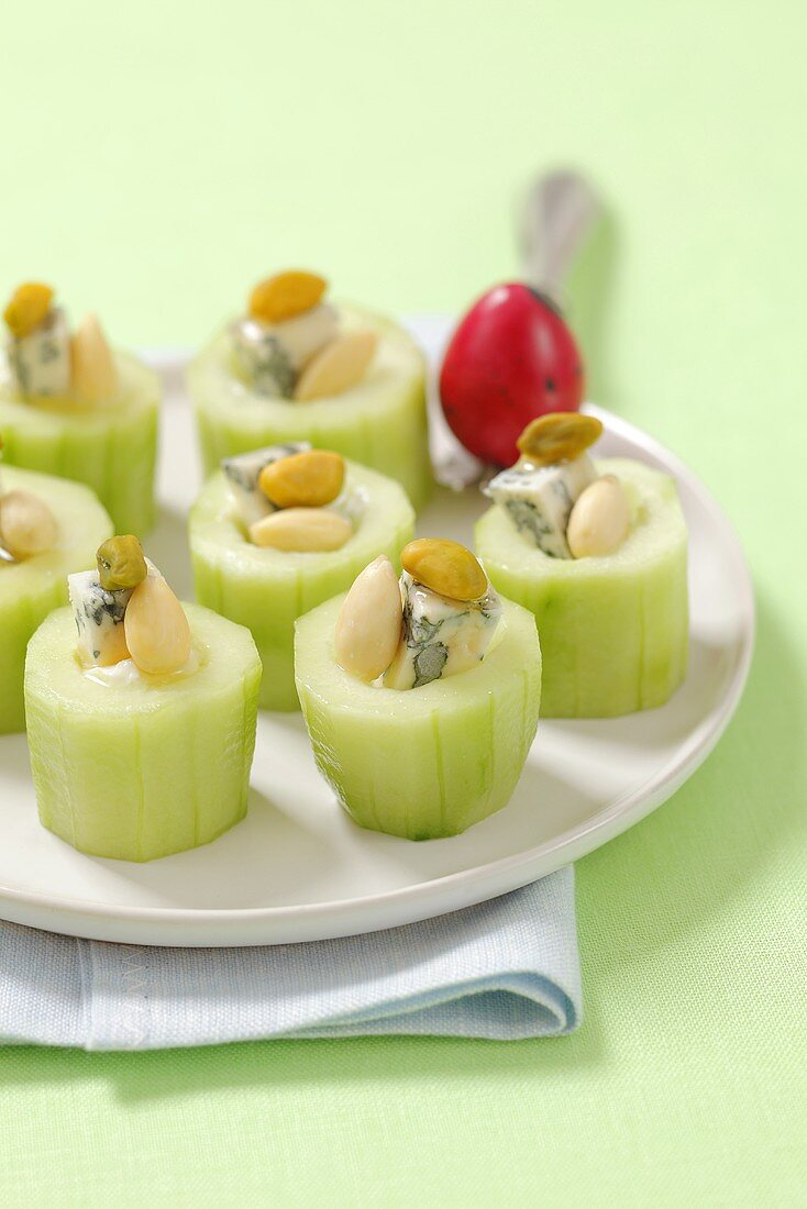 Cucumbers filled with blue cheese, almonds and pistachios