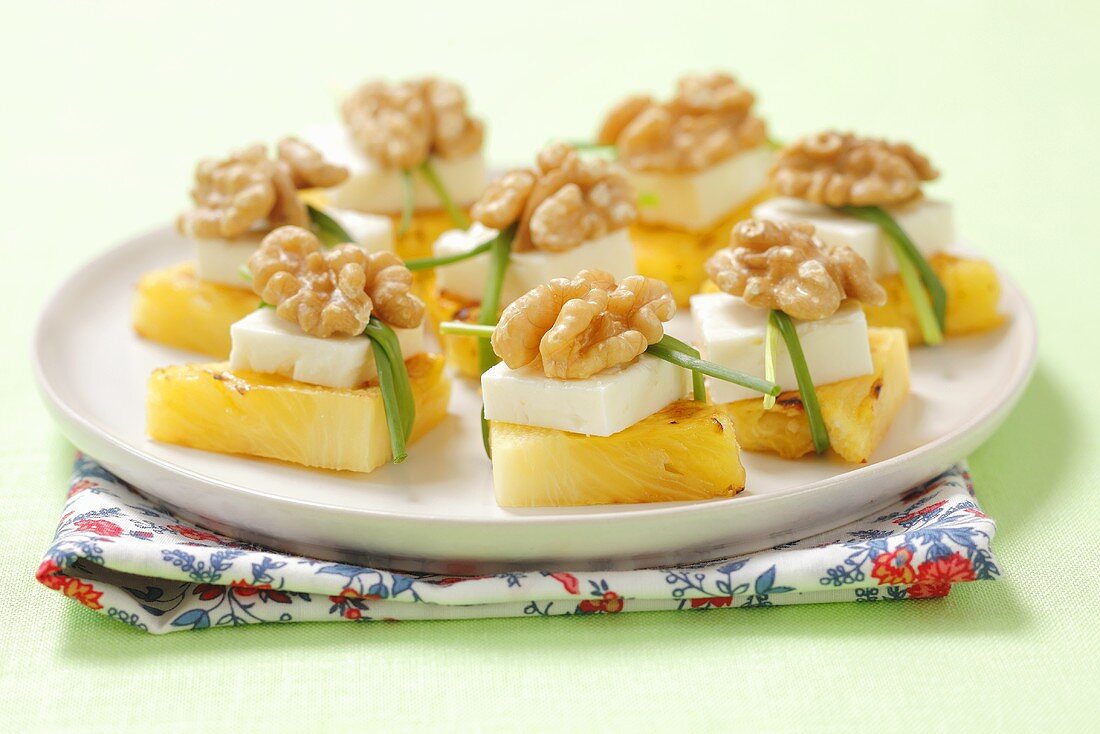 Grilled pineapple with feta and walnuts