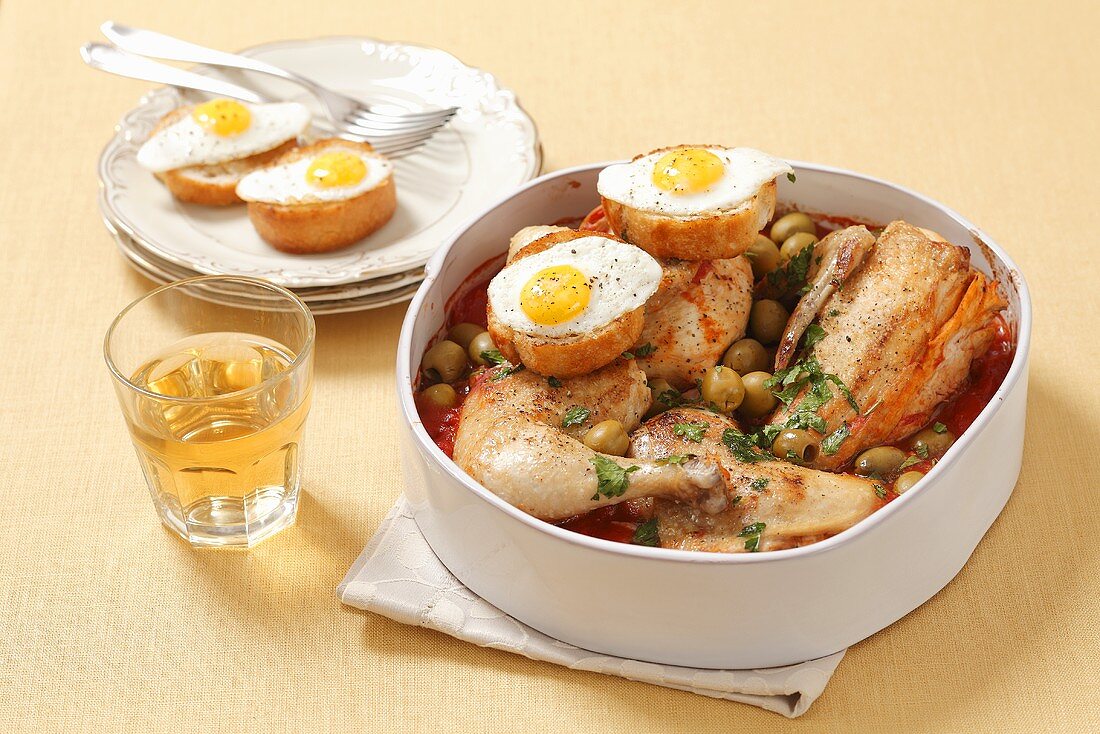 Pollo alla marengo (chicken ragout with quail's eggs and olives)