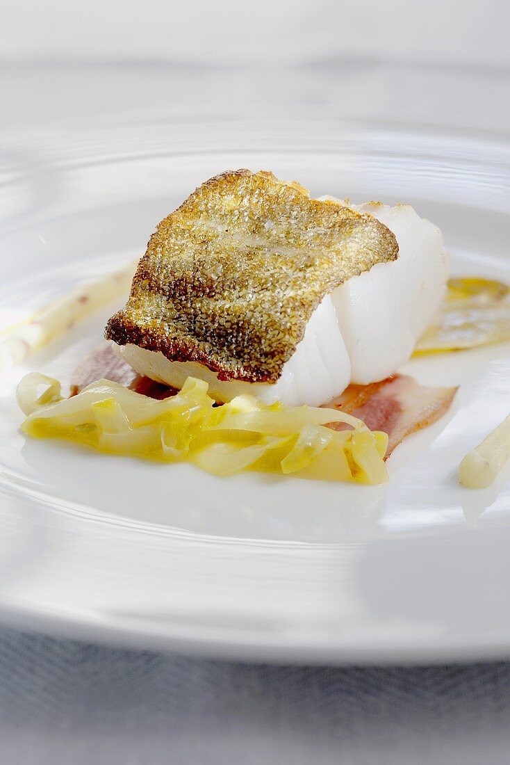 Cod with chicory and bacon