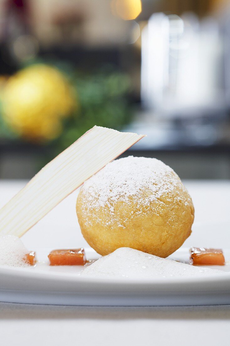 A doughnuts with a wheat beer and chocolate filling served with rhubarb