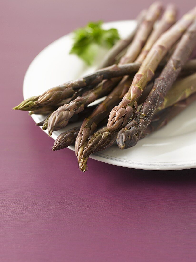A plate of purple asparagus