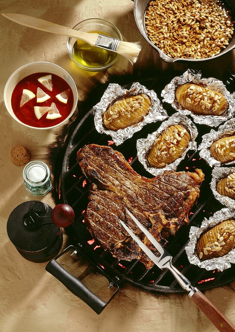 Steak and Baked Potato on the Grill