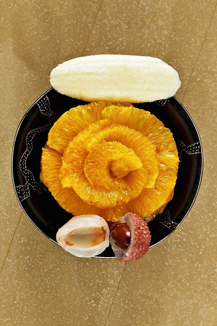Orange tart with banana ice cream and lychees