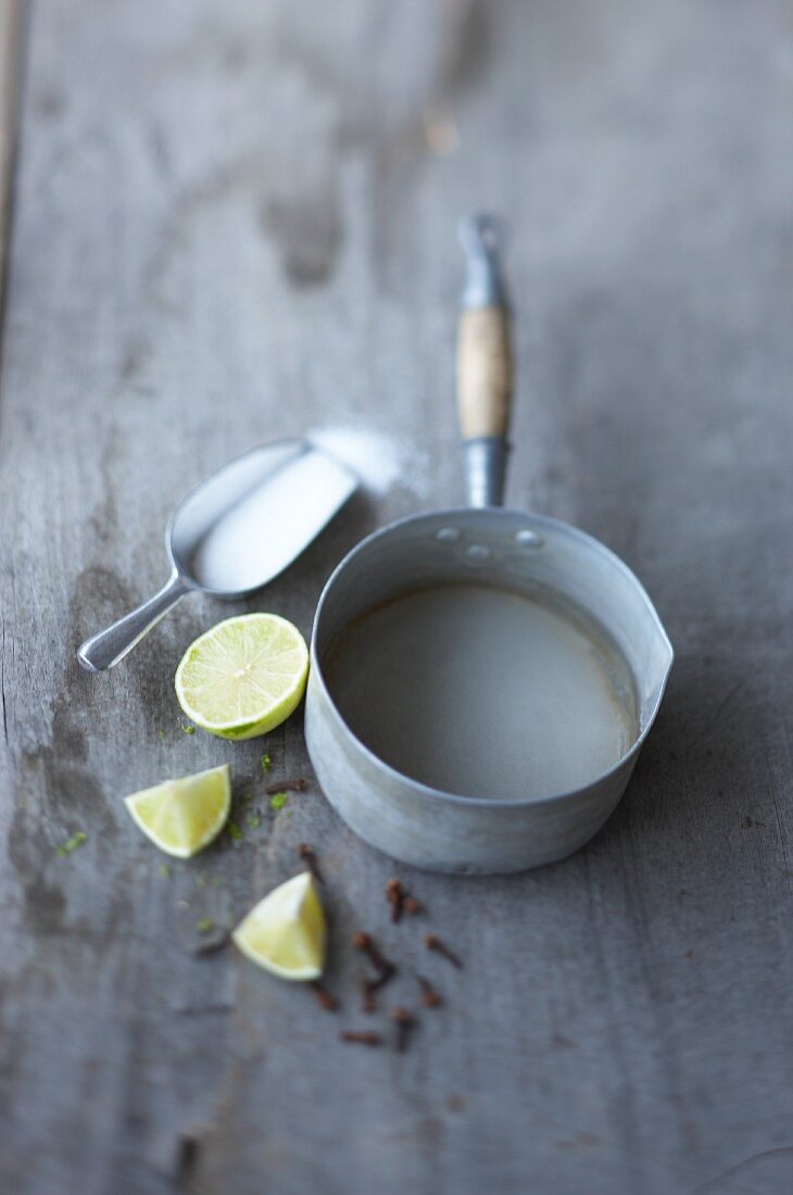 Lime juice with sugar in a saucepan