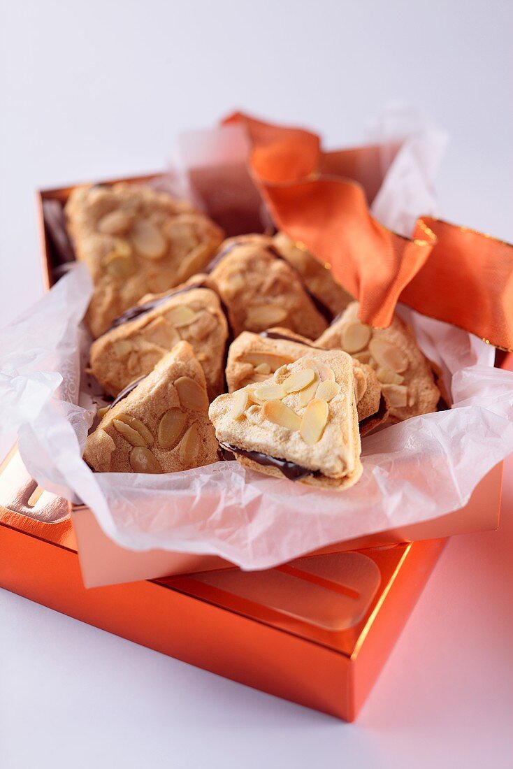 Almond macaroons with meringue and chocolate butter as a gift