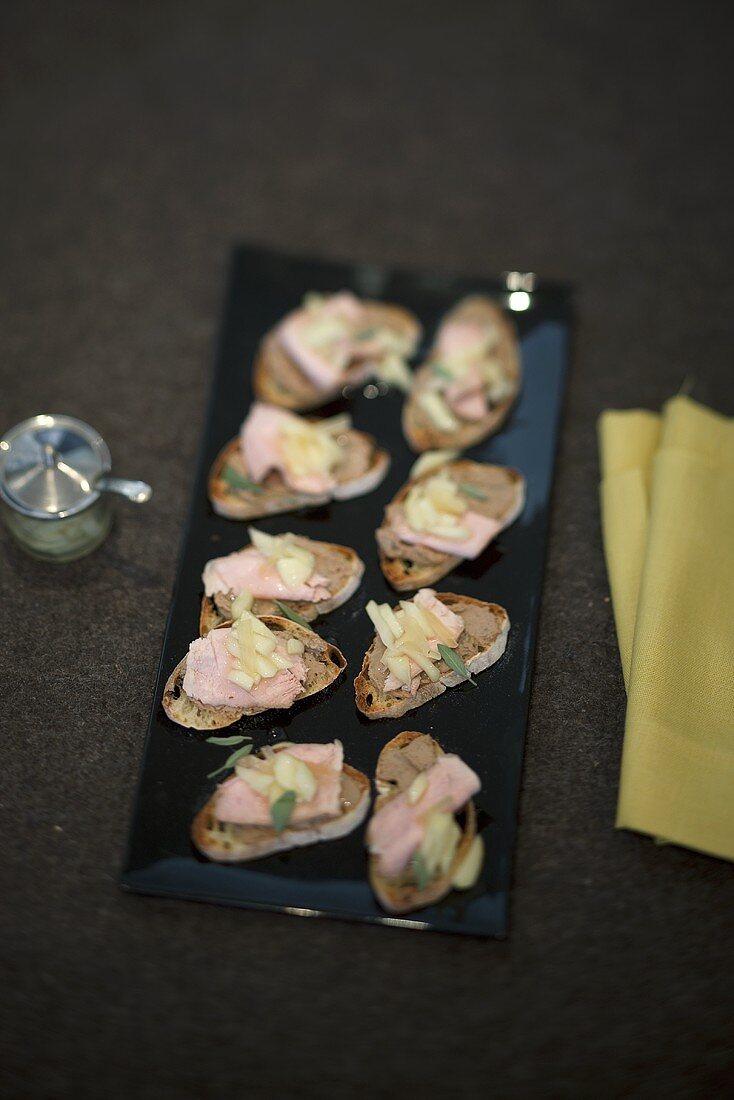 Crostini with veal liver pate and candied ginger strips