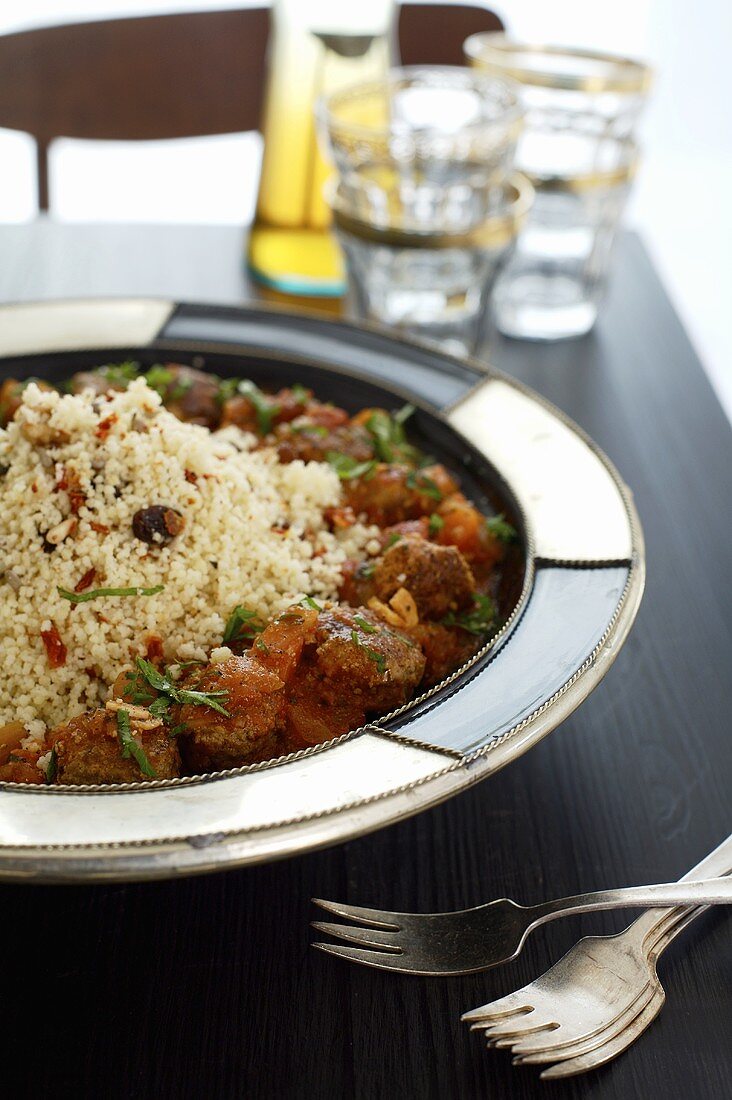 Lamb meatballs with tomato sauce and couscous