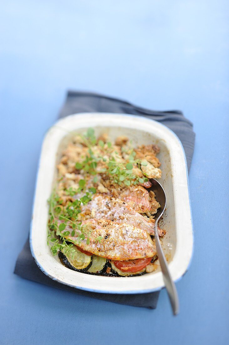 A vegetable bake with red mullet and bran