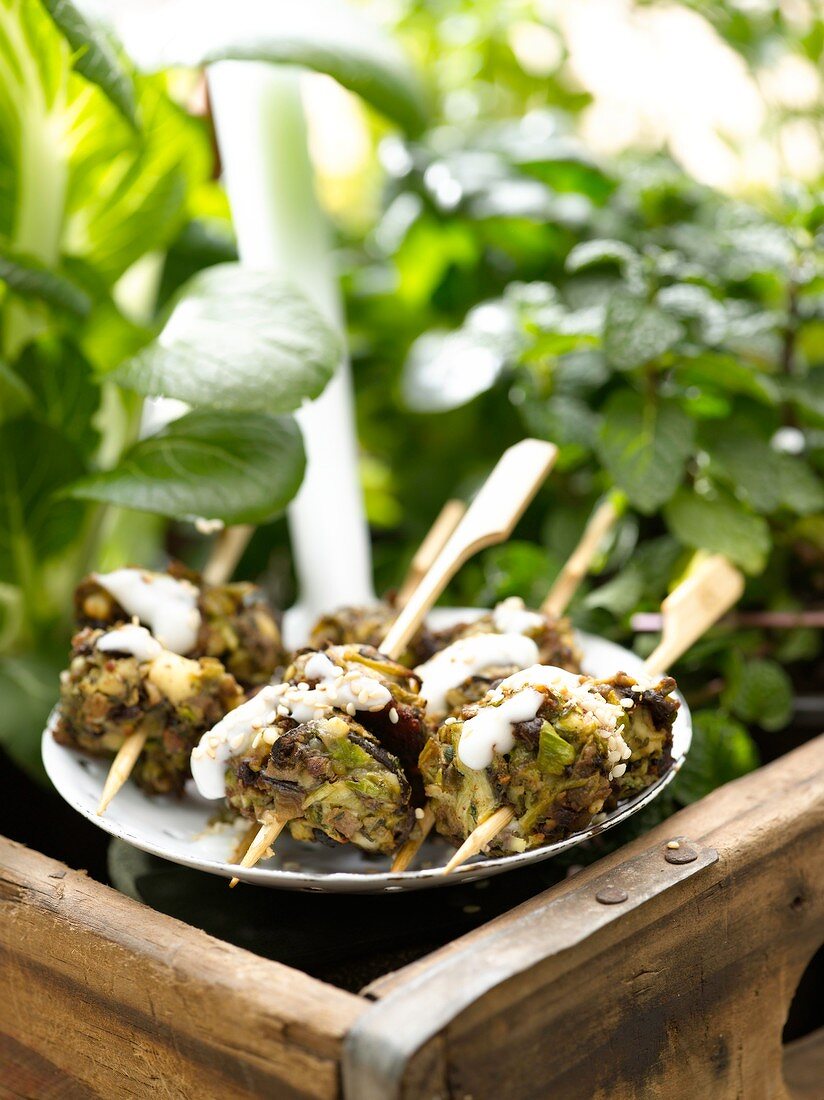 Aubergine and asparagus burgers with thyme and feta