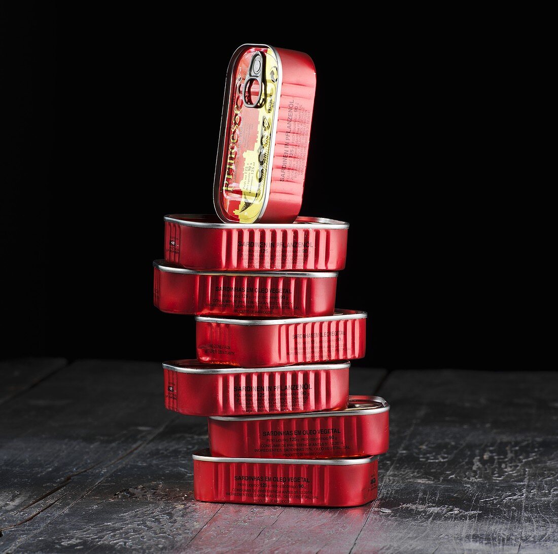 A stack of sardine tins