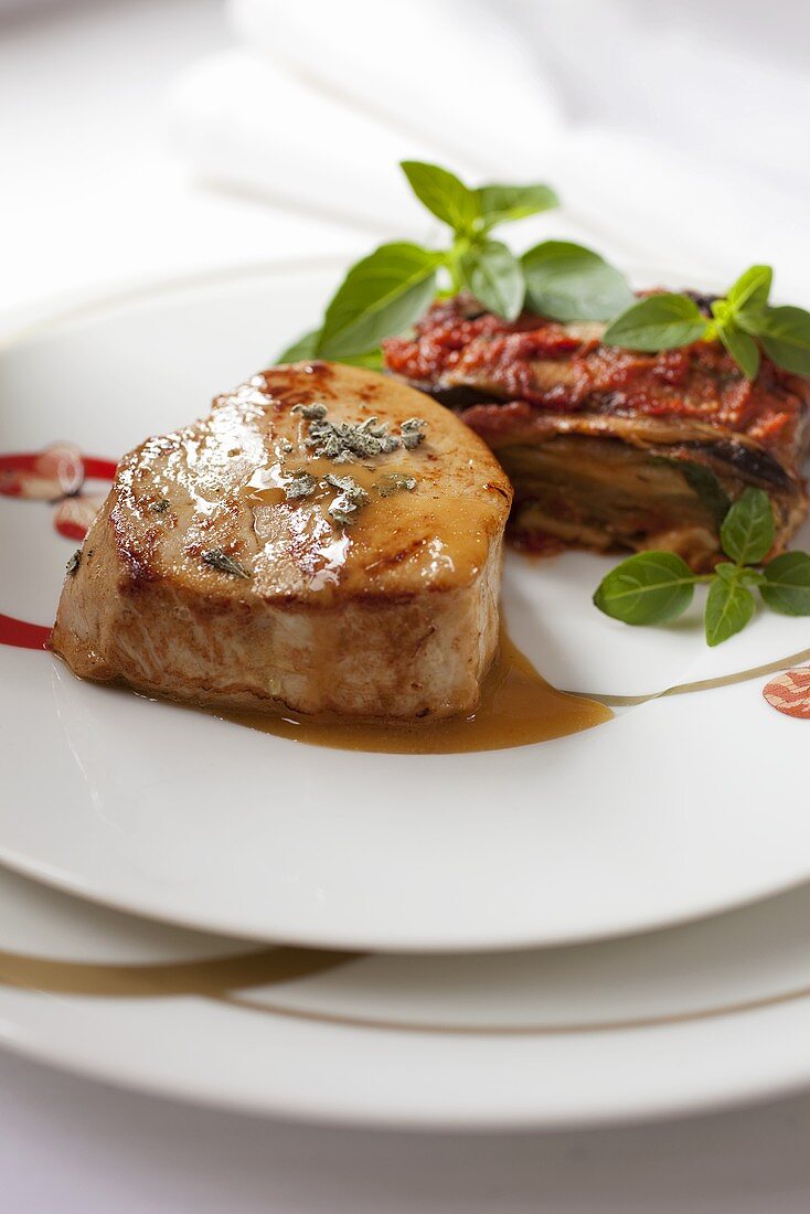 Veal medallions with an aubergine bake