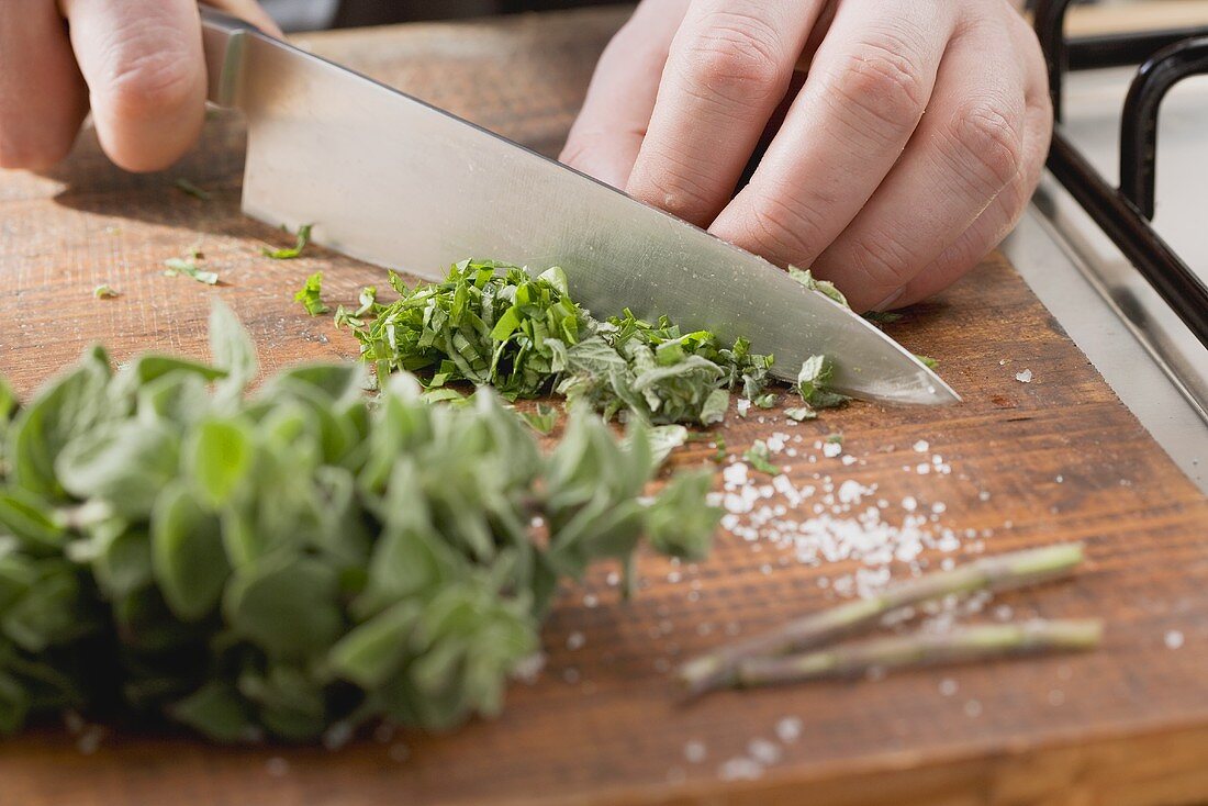 Herbs being chopped