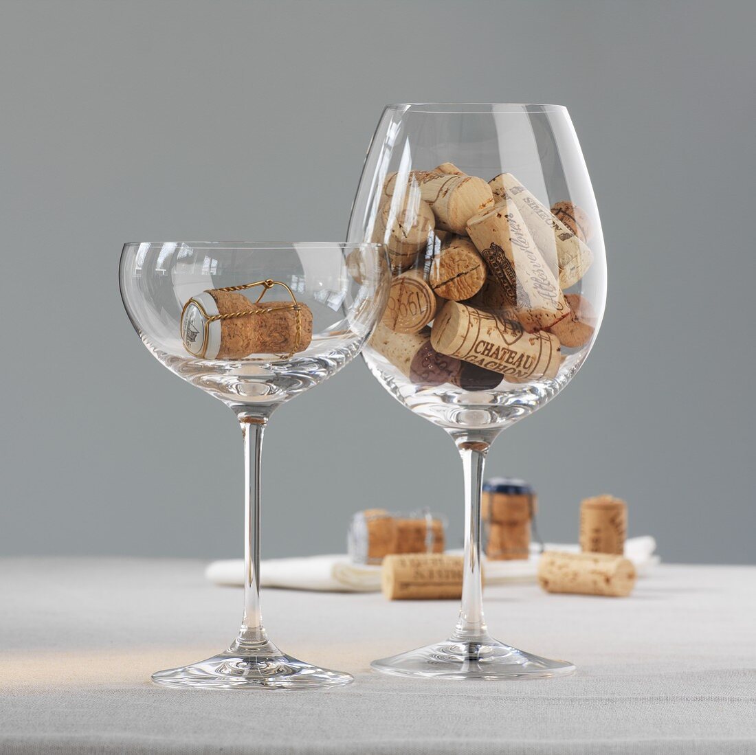 Wine and champagne corks in glasses