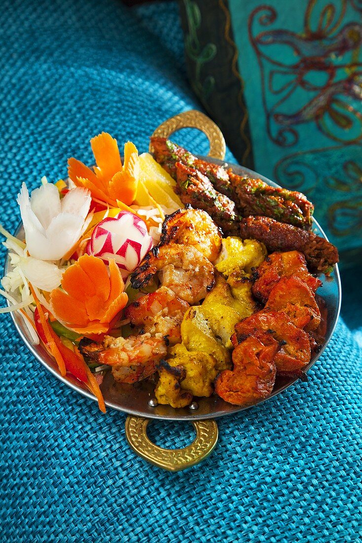 An Indian platter of lamb, prawns and chicken