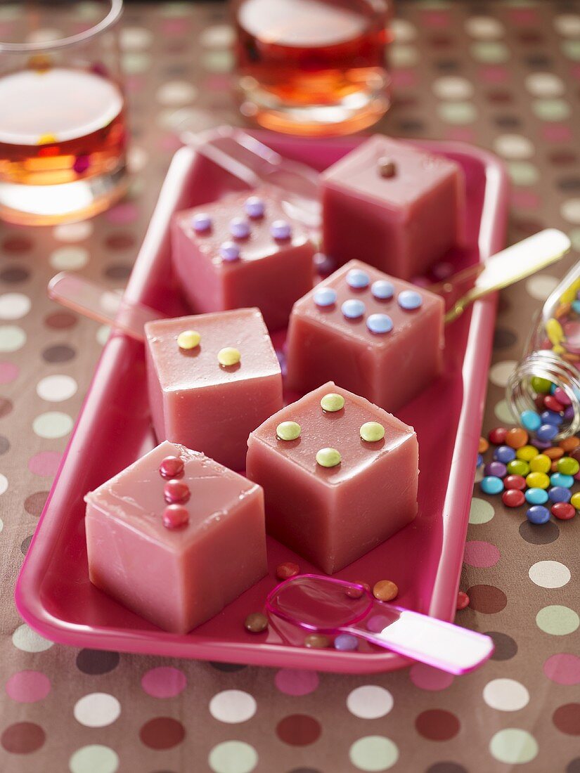 Punch ice cubes with milk chocolate candies