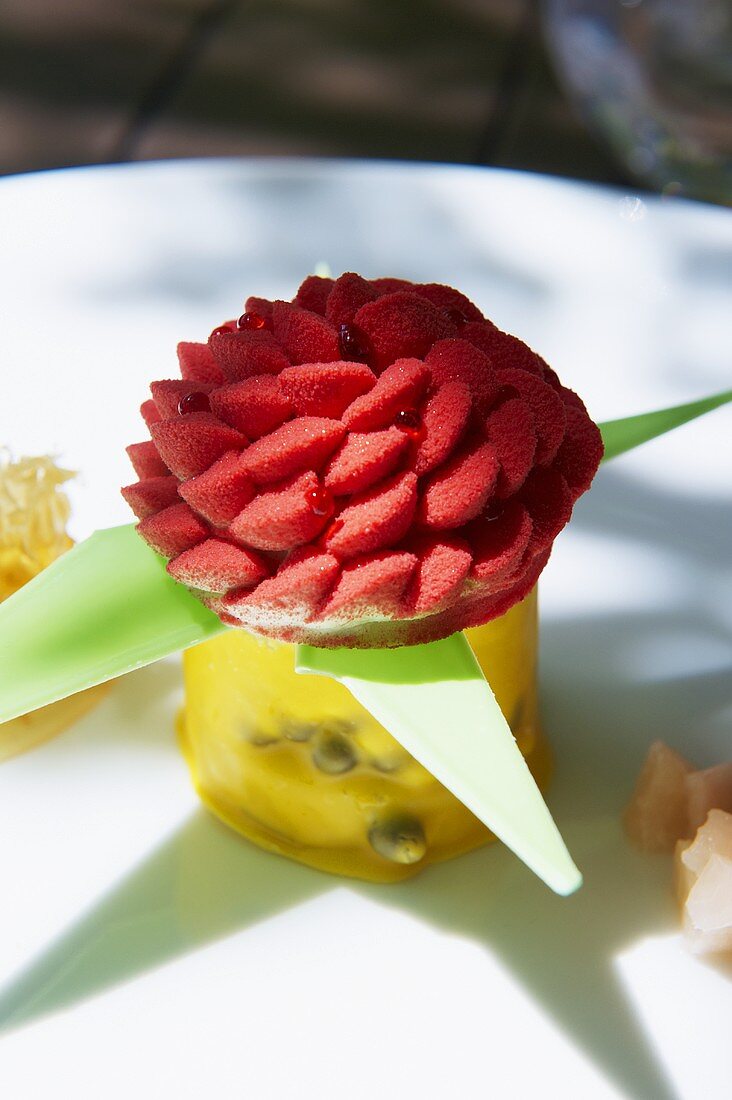 Frozen strawberries on a passion fruit flan