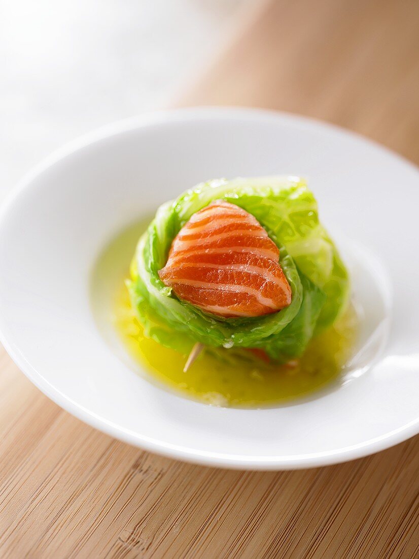 Salmon fillet in a lettuce leaf