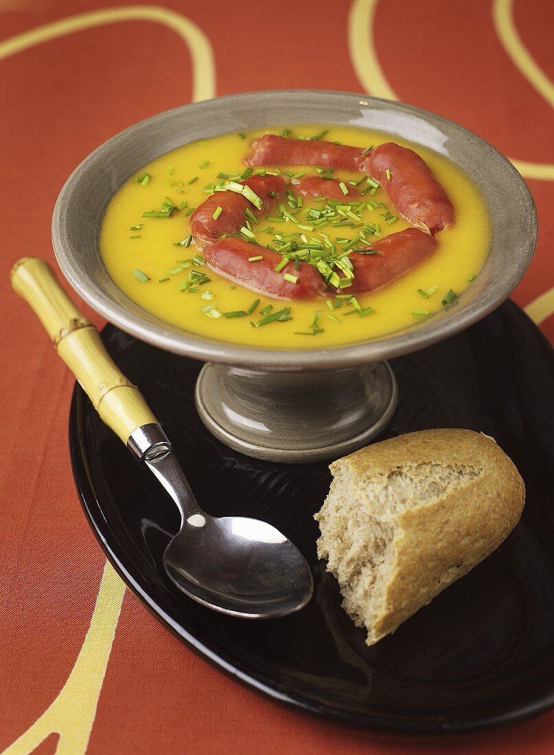 Carrot soup with sausages