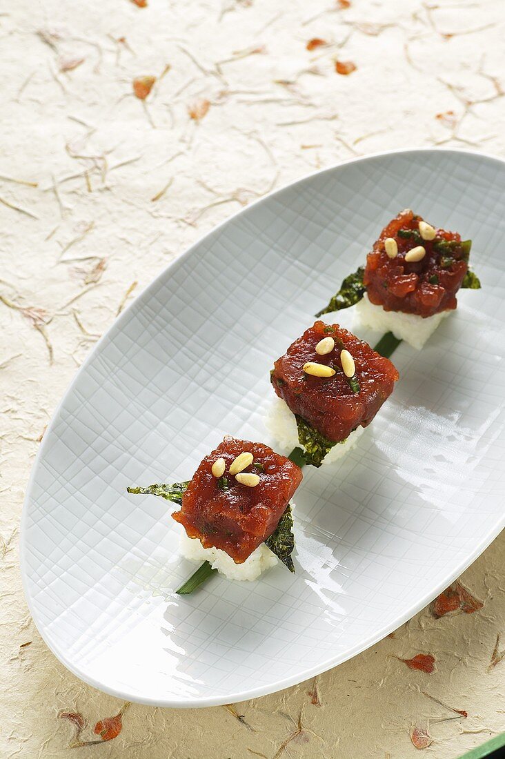 Spicy marinated tuna fish with Nori on sushi rice