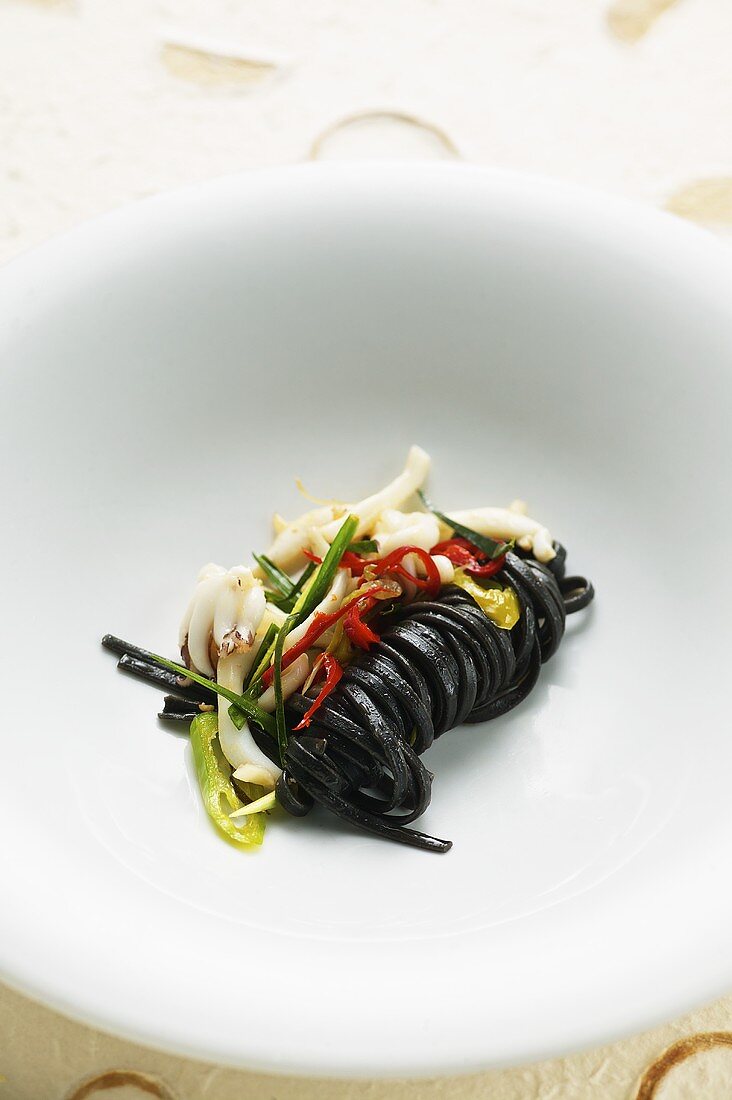 Black spaghetti with squid, lemon grass and chili