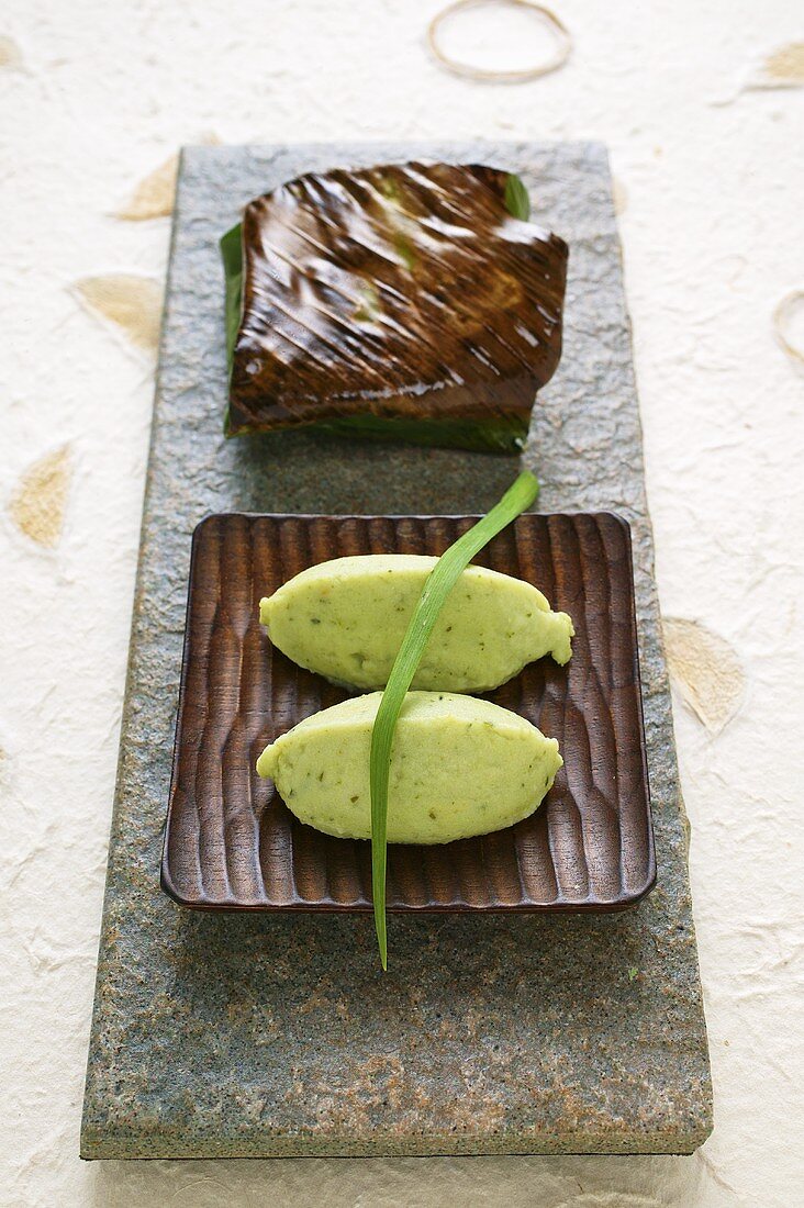Salmon wrapped in banana leaves with wild garlic-potato puree