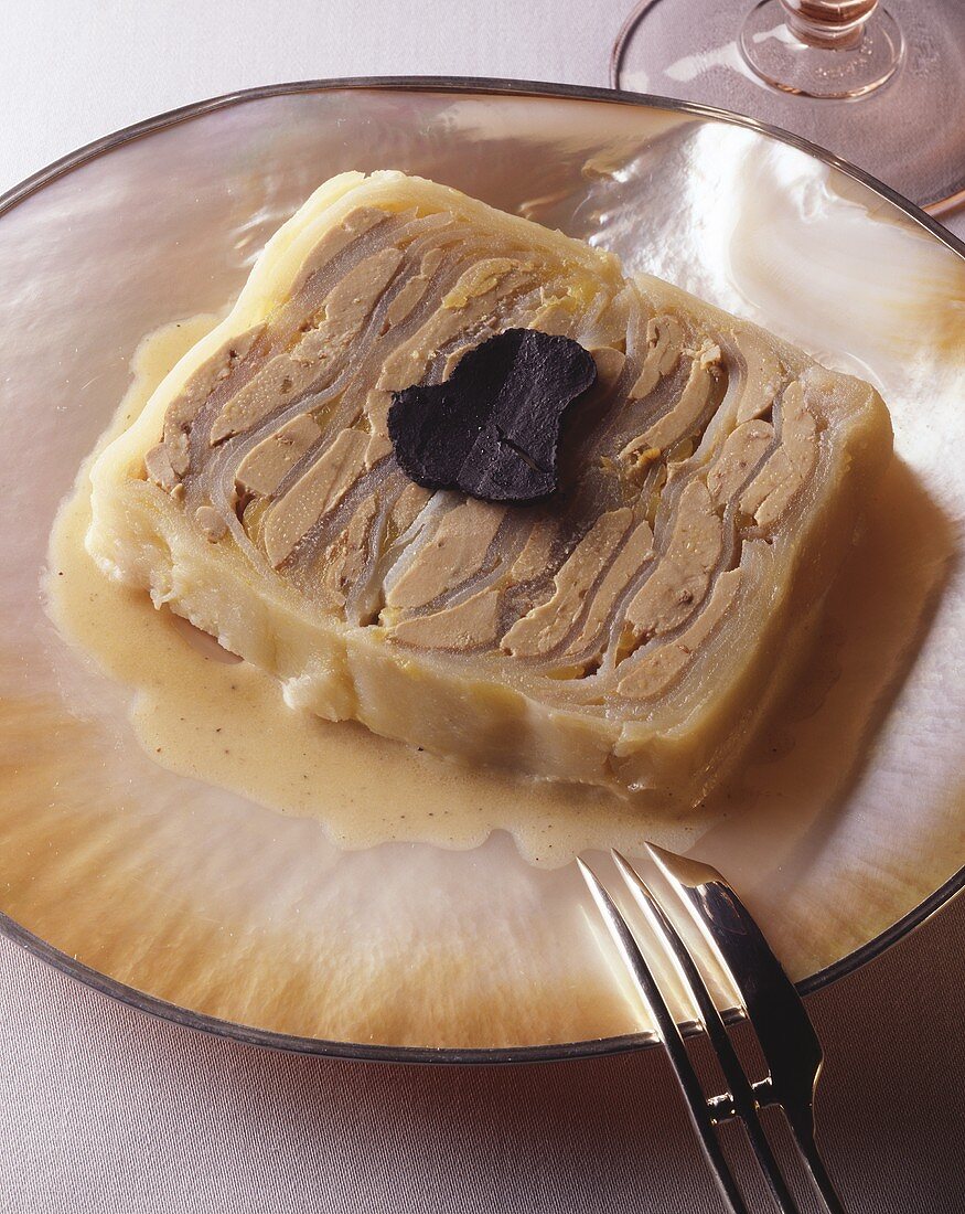 Goose foie gras with black truffle slices