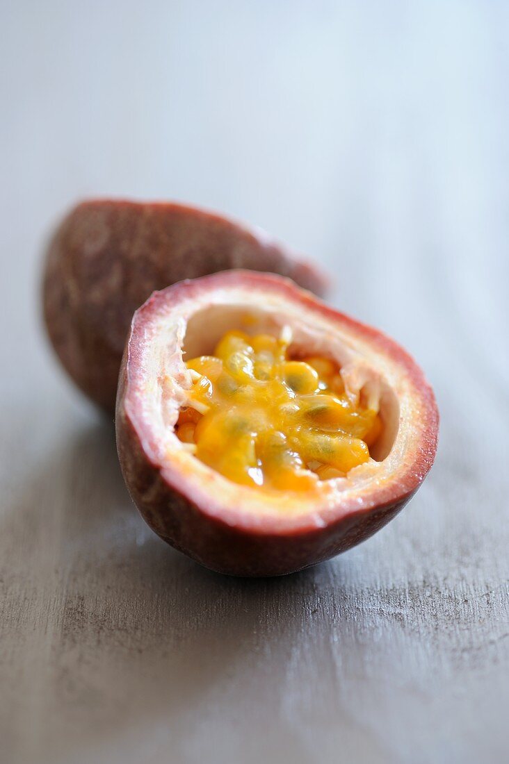 Purple passion fruit, halved