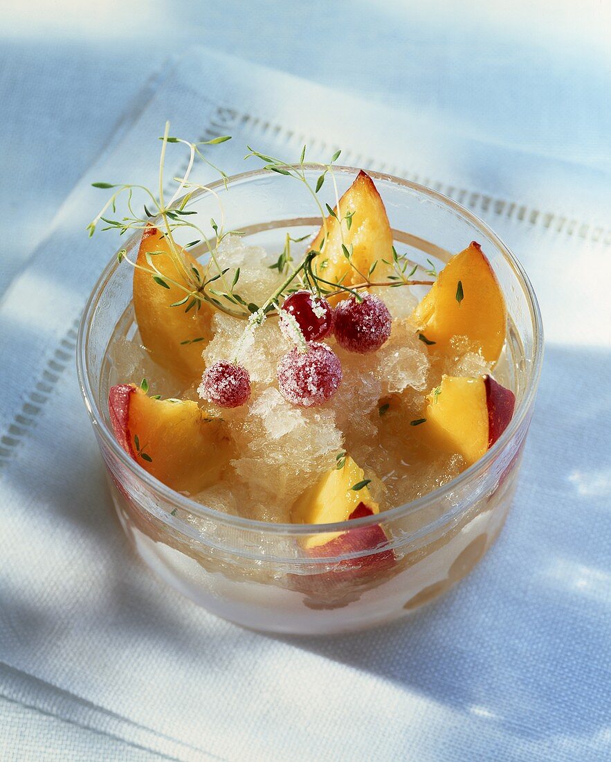 Peach granita with fresh peach wedges