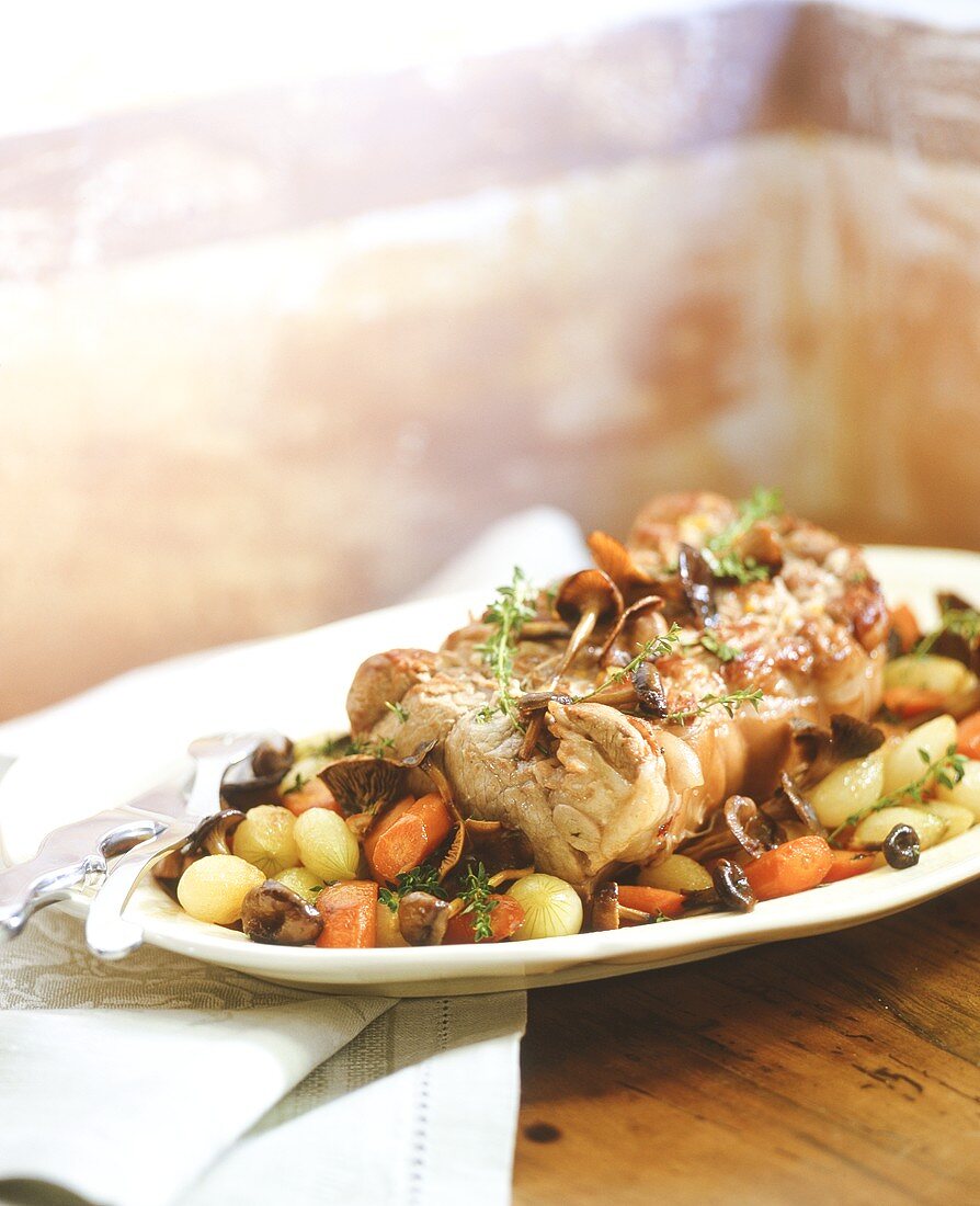 Roast veal with mushrooms and vegetables
