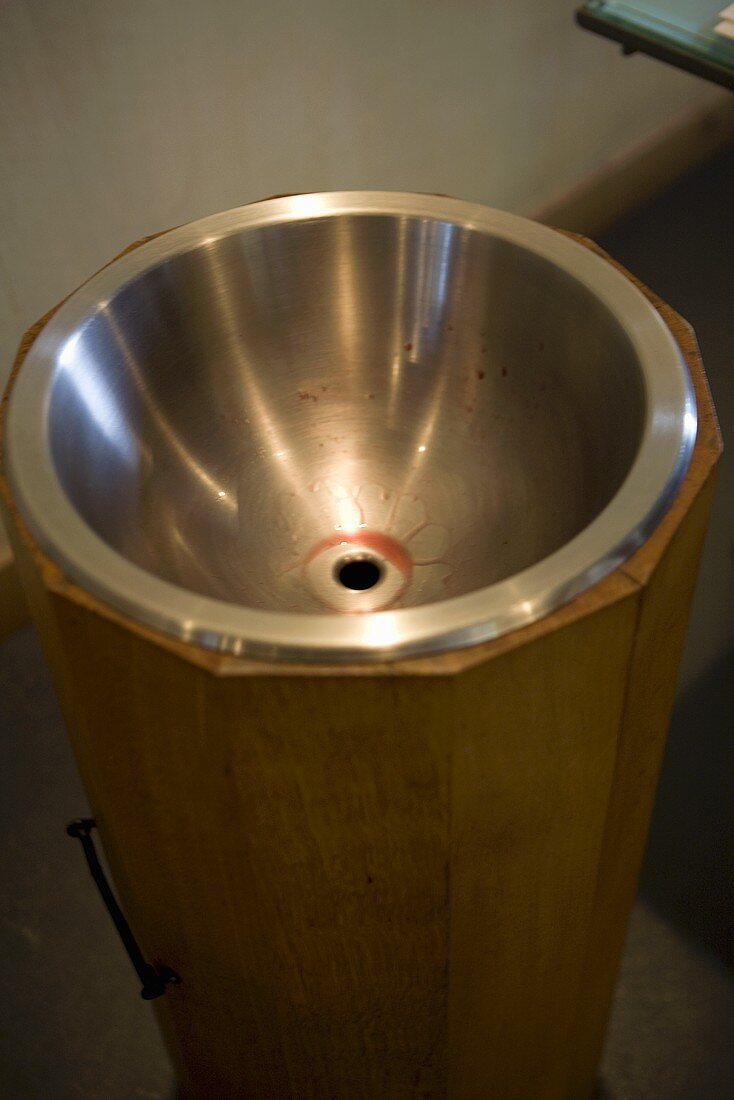 Metal bowl for wine tasting (Chateau Lynch-Bages Winery, France)