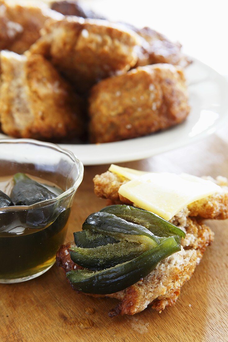 Vetkoek (fried tea cakes, South Africa) with fig preserves