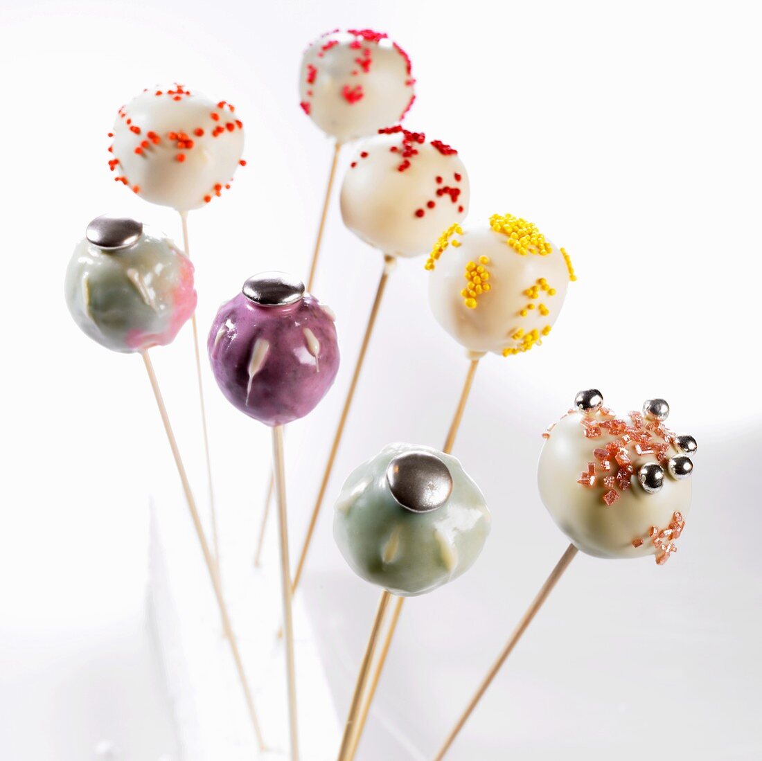 Eight different decorated cake pops