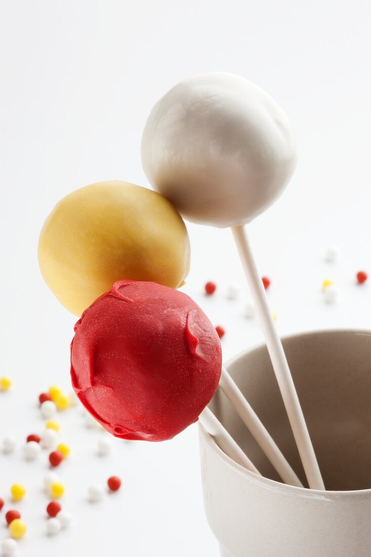 Cake pops, white, yellow and red
