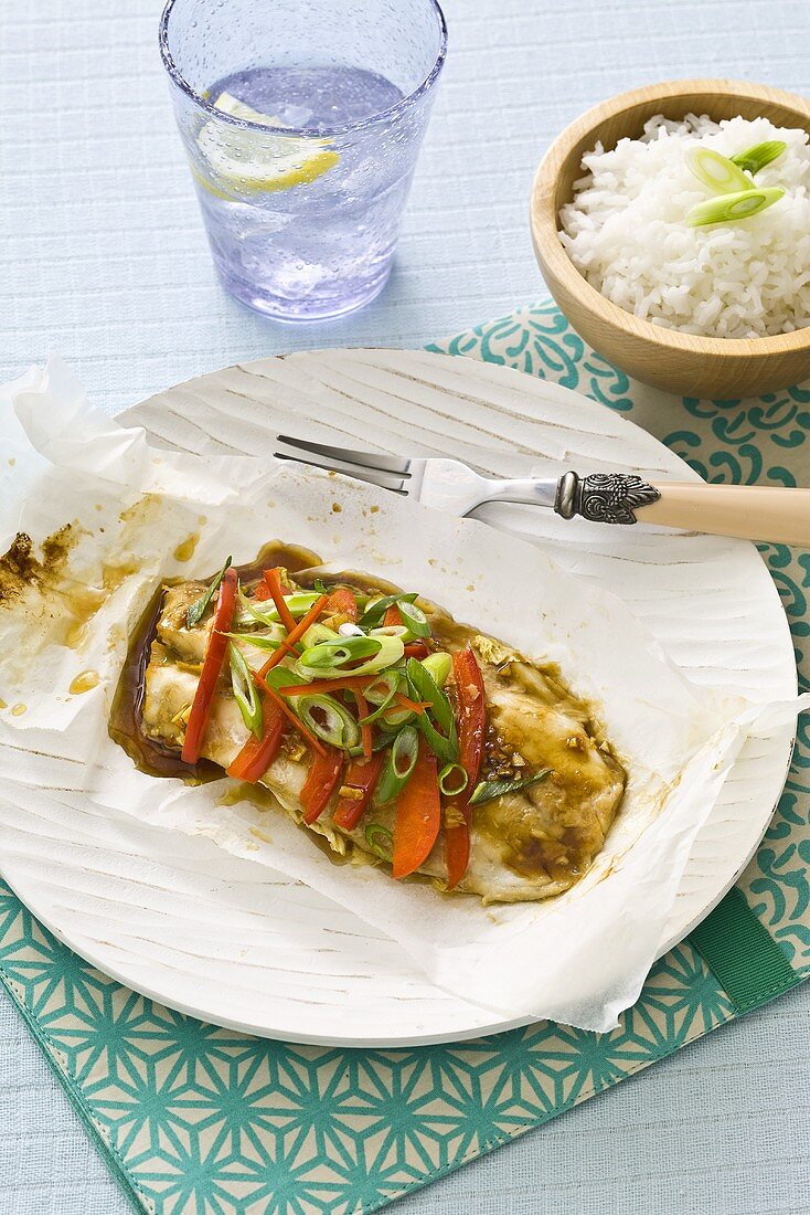 Fish fillet with vegetables in parchment paper