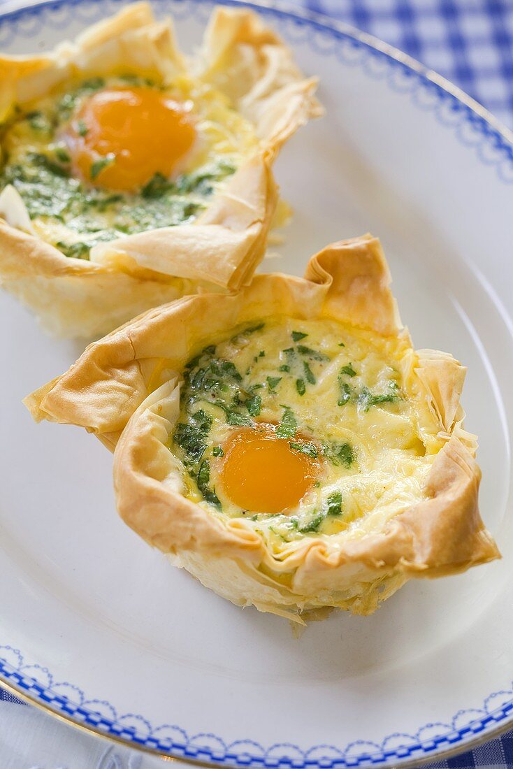 A spicy, stuffed puff pastry tartlet with egg and bacon